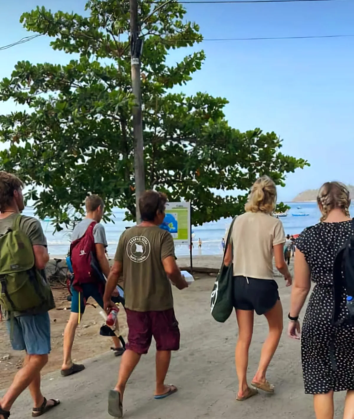 Travelers walking to the boat in Santa Catalina